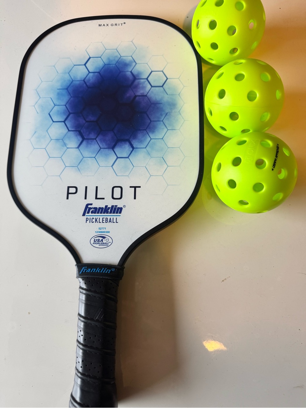 New Pickleball Paddle and Balls
